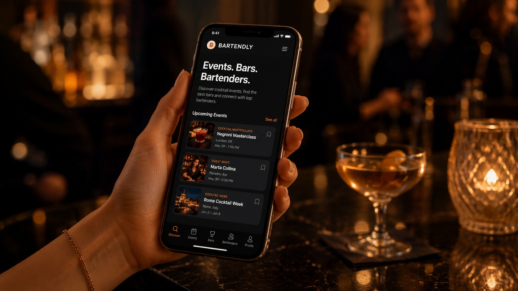 Bartendly app on a smartphone showing cocktail events