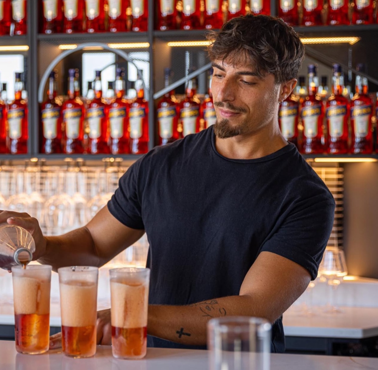Bartender in London mixing cocktails at a private event